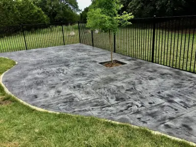 Distinctive Stamped and Stained Decorative Concrete Patio - Spring Branch, TX — Deck Building & Repair project by Diamond Decks