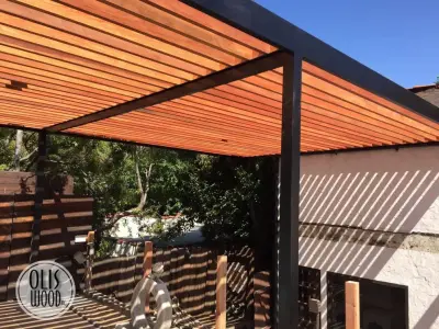 Custom Metal Framed Wood Pergola — Deck Building & Repair project by Olis Wood Inc.