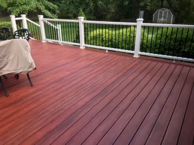 Zuri Brazila Deck Featuring White Trex Railing — Deck Building & Repair project by Miles Deck Construction