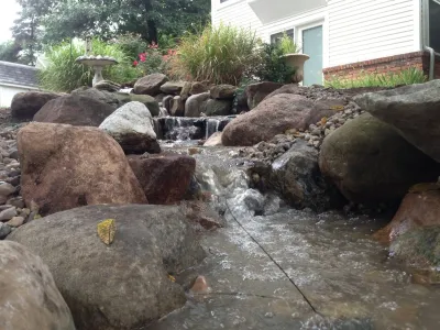 Pondless Waterfall for Retired Fire Fighters — Landscape Construction project by Put's Ponds & Gardens