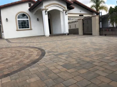 Circle pattern pavers and driveway — Landscape Construction project by Quetzal Landscapes, Inc. in San Diego