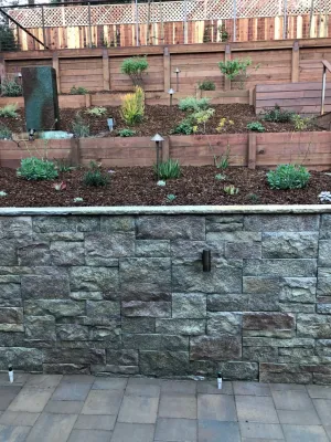 Wood IPE deck and steps, low Voltege lights,retaining walls with veneers stones by RainforestLA,inc.