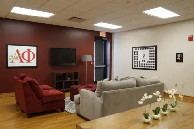 Sorority House Versatile Living Room and Community Area — Interior Design & Decorating project by Amethyst Interiors LLC