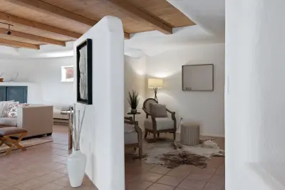 Roomy Tesuque Pueblo-Inspired Residence — Interior Design & Decorating project by Pink Dwelling