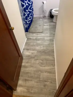 Bathroom Flooring Installation — Handyman Services project by Daniels Home Renovations And Landscaping