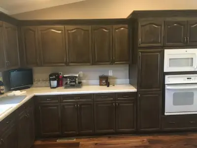 Crown Molding Installation and Kitchen Cabinet Distressing by Kiger Custom Creations