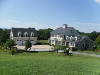 Paver stone driveway — Landscape Construction project by Rock Water Farm