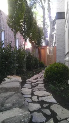 Stone path with plantings — Landscape Construction project by Rock Water Farm