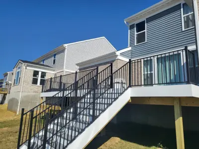 22x14 Beach House Deck with Composite Material, Black Aluminum Railings, and 6' Recessed Hot Tub by Jaguar Decks And Fences