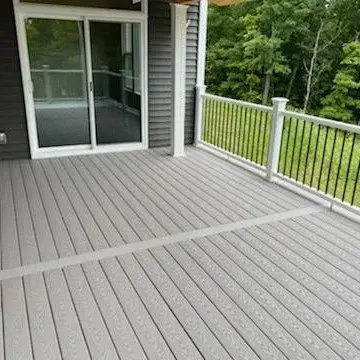 20x12 Composite Deck/Roof Featuring PVC, Black Aluminum Railings, and Solar Lighting by Jaguar Decks And Fences