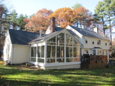 Transformed Screen Room into Cathedral-Style Family Room — Deck Building & Repair project by New England Sunrooms & Conservatories, Inc.