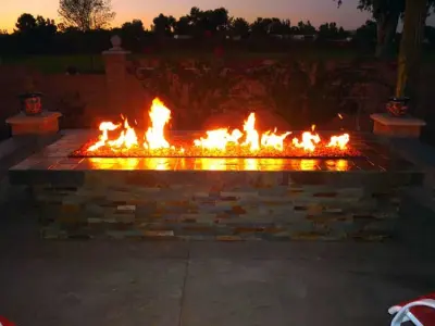 Flame Elements — Deck Building & Repair project by Premier Landscape And Stone