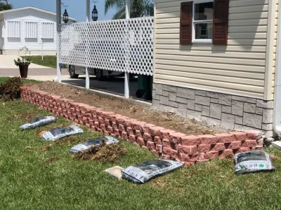 Retaining Walls/Borders — Landscape Construction project by Rooted Landscape Services Of IRC LLC