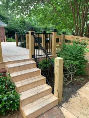 Expansive deck constructed atop an existing patio — Deck Building & Repair project by Narron Woodworks