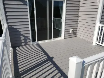 10x14 Composite Deck with White Lattice and Fascia Trim — Deck Building & Repair project by Jaguar Decks And Fences