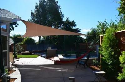 Contemporary Canopy — Deck Building & Repair project by Pacific Shade Sails