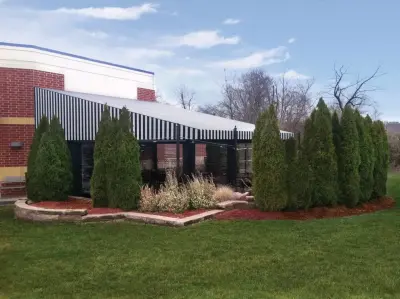 Patio Awnings for Commercial Use — Deck Building & Repair project by Capital City Awning