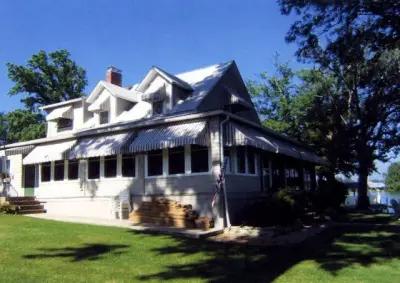 Home window and door canopies — Deck Building & Repair project by Capital City Awning
