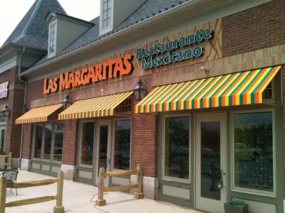Dining Venue Canopies — Deck Building & Repair project by Capital City Awning
