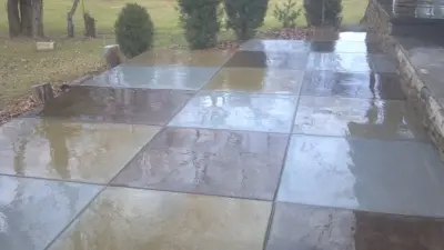 Colored concrete patio — Deck Building & Repair project by Architectural Concrete