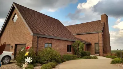 Walnut Metro Stone-Coated Steel Cottage Shingle — Deck Building & Repair project by VanWeelden Co.