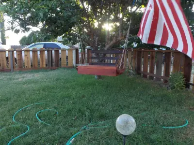 Redwood and Oak Swing for the Backyard in Modesto, CA — Deck Building & Repair project by Diamond K Woodworks LLC