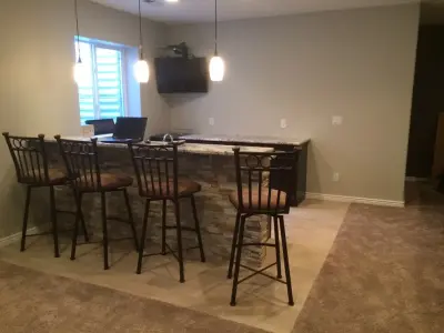 Basement Renovations — Deck Building & Repair project by Integrity Building And Remodeling