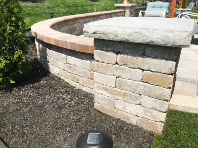 Stunning Missouri Paver Patio Featuring a Fire Pit and Pergola by Kansas City Hardscapes