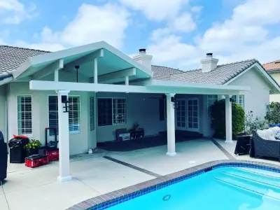 Stunning Patio Cover for the Poolside — Deck Building & Repair project by Integrity Patio Covers