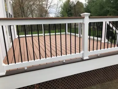 Stunning TREX Transcend "Tiki Torch" deck featuring cocktail railing — Deck Building & Repair project by DTR Construction Service