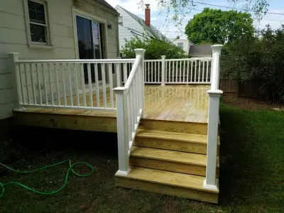 Backyard Deck Transformation — Deck Building & Repair project by Decks Unlimited LLC