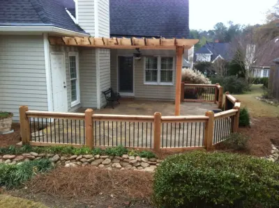 Cedar pergola featuring cedar accent railings — Deck Building & Repair project by DeckThisOut