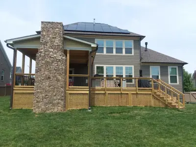 Burlington NC Outdoor Fireplace with Deck and Covered Porch — Deck Building & Repair project by Archadeck Piedmont Triad