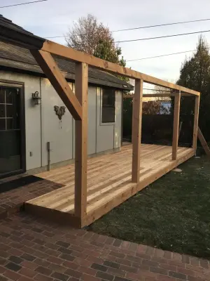 Cedar Porch Incorporated into Brick Pathway and Stone Patio with Added Roof and Closet — Deck Building & Repair project by The Deck Pro