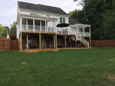 Eze Breeze Window Room with Double White Aluminum Pergolas in Clemmons, NC — Deck Building & Repair project by Archadeck Piedmont Triad