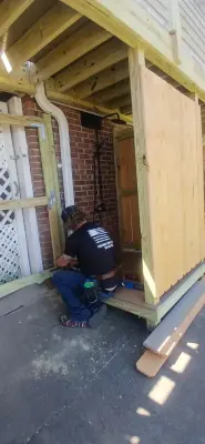 Balcony Composite with Outdoor Shower Enclosure — Deck Building & Repair project by Freeman Home Repair