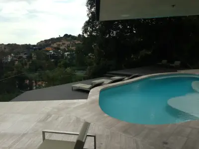 Poolside Composite Deck — Deck Building & Repair project by Danny Deck Construction, Inc.