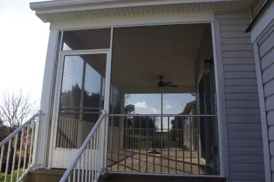 Enclosed porch — Deck Building & Repair project by Custom Design Fence And Deck