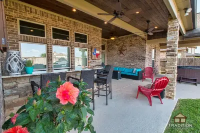 Cypress, TX: Patio with Hot Tub and Bar — Deck Building & Repair project by Tradition Outdoor Living