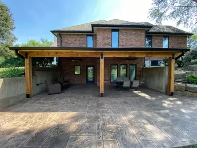 Wellsville, Kansas Stamped Concrete Patio Enclosure — Deck Building & Repair project by DW Elite Decks