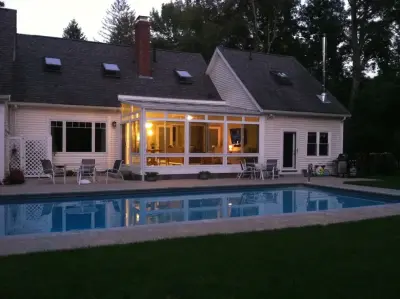 Enhanced Backyard Access and Optimized Home Traffic Flow — Deck Building & Repair project by New England Sunrooms & Conservatories, Inc.