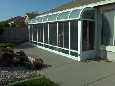 Sacramento Curved Eave Sunroom — Deck Building & Repair project by Petkus Brothers