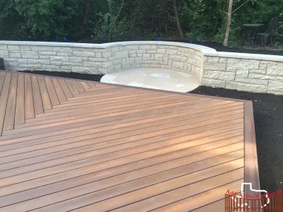Curved Fiberon Ipe Deck and Leuder Retaining Wall — Deck Building & Repair project by Austin Add-A-Deck