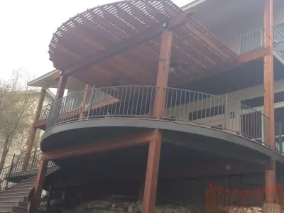 Curved Trex Tiki Torch Patio and Cedar Pergola — Deck Building & Repair project by Austin Add-A-Deck