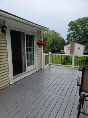 tailored composite deck with updated steps — Deck Building & Repair project by Dynamic Deck Solutions