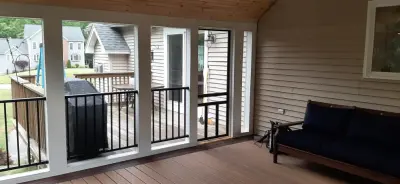 bespoke screened porch featuring floor-to-ceiling screens — Deck Building & Repair project by Dynamic Deck Solutions