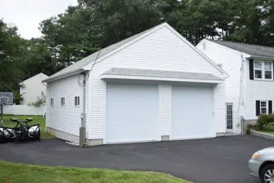Personalized Vinyl Double Car Garage — Deck Building & Repair project by Baystate Outdoor Personia