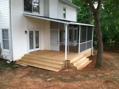 Screened Room and Covered Deck Addition — Deck Building & Repair project by Express Sunrooms Of Greenville