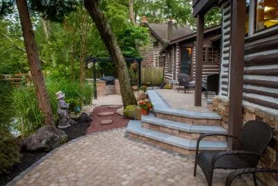 Lake Front Patio and Built In Grill by Sherwood Landscape Lighting And Design
