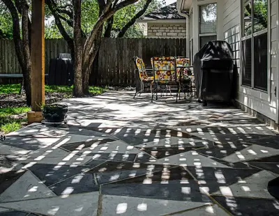 Diverse Stone Patio Arrangement in Varied Design — Deck Building & Repair project by Georgetown Fence & Deck